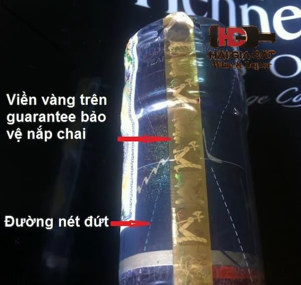 Cách nhận biết rượu Hennesy thật: Guarantee bọc nắp chai